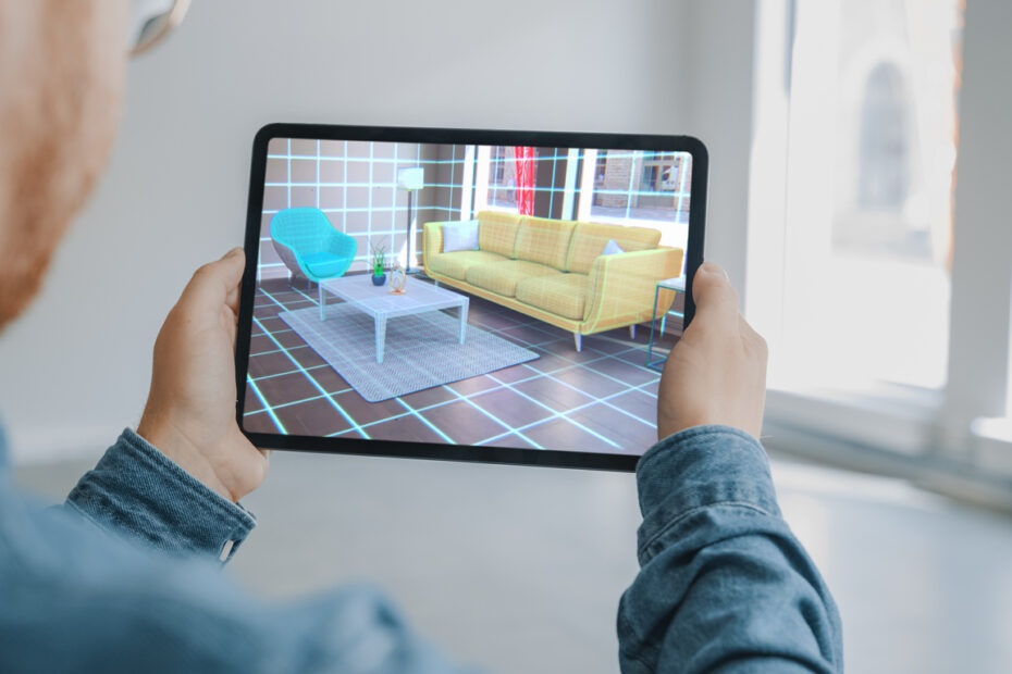 Man Holding Digital Tablet